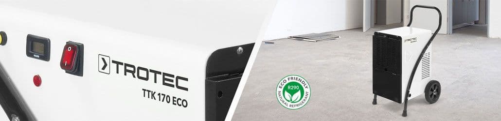 Witte Trotec TTK 170 ECO bouwdroger met eco-label R290, geplaatst in een lege ruimte met betonnen vloer tijdens renovatiewerkzaamheden.