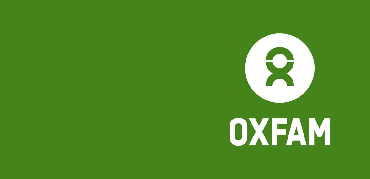 Groen Oxfam logo met gestileerde figuur en de tekst Oxfam eronder.